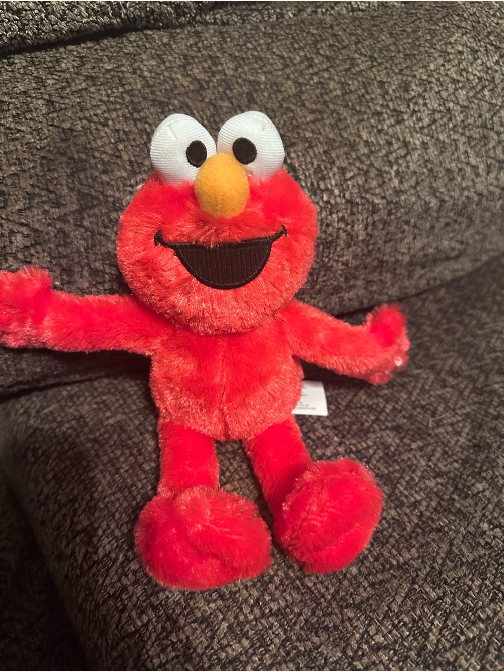 Sesame Street Elmo Plush Toy in Bright Red with Yellow Nose